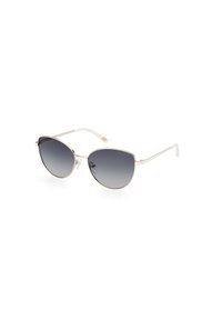 Gafas de sol de estilo cat-eye con lentes oscuros en degradado, montura delgada de metal dorado y puntas blancas en las varillas. Textura suave y diseño elegante.