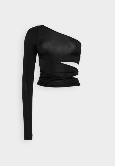 Black long-sleeve top featuring an asymmetric cut-out design, ruched detailing, and a smooth, stretchy fabric.