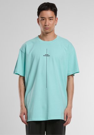 THINK DIFFERENT HEAVY - Print T-shirt - berylblue