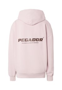 Sweat à capuche rose clair avec « PEGADOR » et « PEGADOR ALL RIGHTS RESERVED » imprimés en gros caractères marron au dos.