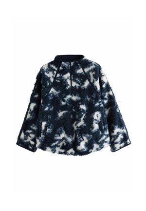 Pull en polaire bleu marine avec un motif camouflé blanc, doté de manches longues, d'un col montant et d'un tissu texturé. Agrémenté de bordures sombres.