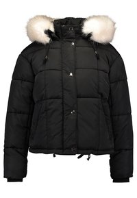 Svart vadderad pufferjacka med tryckknappar framtill, två sidofickor och huva kantad med vita konstpäls pom-poms.