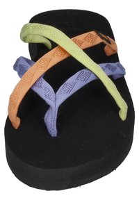 Black flip-flop with a thick sole. Features woven straps in green, orange, and purple, crossing over the top in a crisscross pattern.