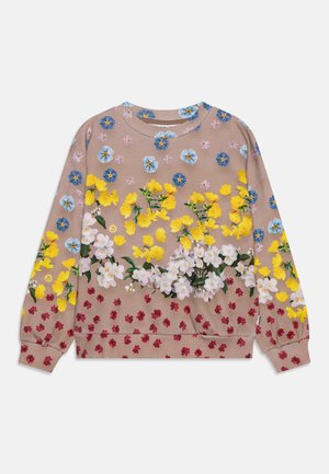 Sudadera beige de manga larga con puños acanalados, con patrones florales en azul, amarillo, blanco y rojo en la parte delantera y las mangas.