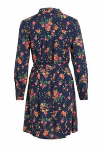 Navy blue long-sleeve dress with a colorful floral pattern and a matching fabric belt at the waist, shown from the back.