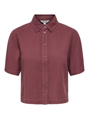 Kortermet skjorte med knapper i dempet lilla farge, med klassisk krage og en lett avkortet nederkant.