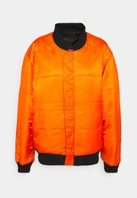 Padded bomber jacket in bright orange with a black ribbed collar and cuffs. Features a front closure and side pockets. Smooth, shiny fabric.
