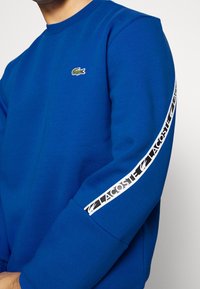 Lacoste Mikina - blue