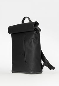 Black roll-top backpack made of durable material, featuring a front zip pocket, adjustable straps, and minimalistic design details.