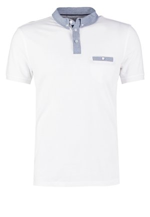 Valge polo särk denim kaelusega, millel on nööbiplakk ja rinna tasku. Lühikesed varrukad, mille pind on sile ja pehme.