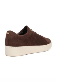 Brown suede sneaker with a quilted design, featuring a white platform sole and small gold hardware accent on the heel.