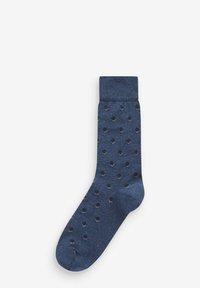 Marineblaue Baumwollsocke mit einem gerippten Bündchen und einem strukturierten Punktenmuster in helleren Farbtönen. Nahtloses Zehendesign für zusätzlichen Komfort.