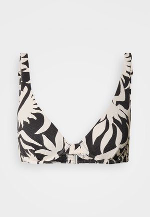 Zwart-wit bikini top met patroon en een gestructureerde afwerking, voorzien van brede bandjes en een V-hals, met een sluiting aan de achterkant.