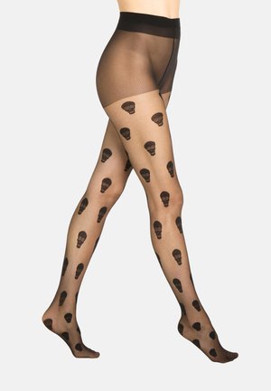 Collants noirs à motif présentant un design semi-transparent avec des motifs de crânes répétés, mettant en valeur la texture et la forme ajustée.