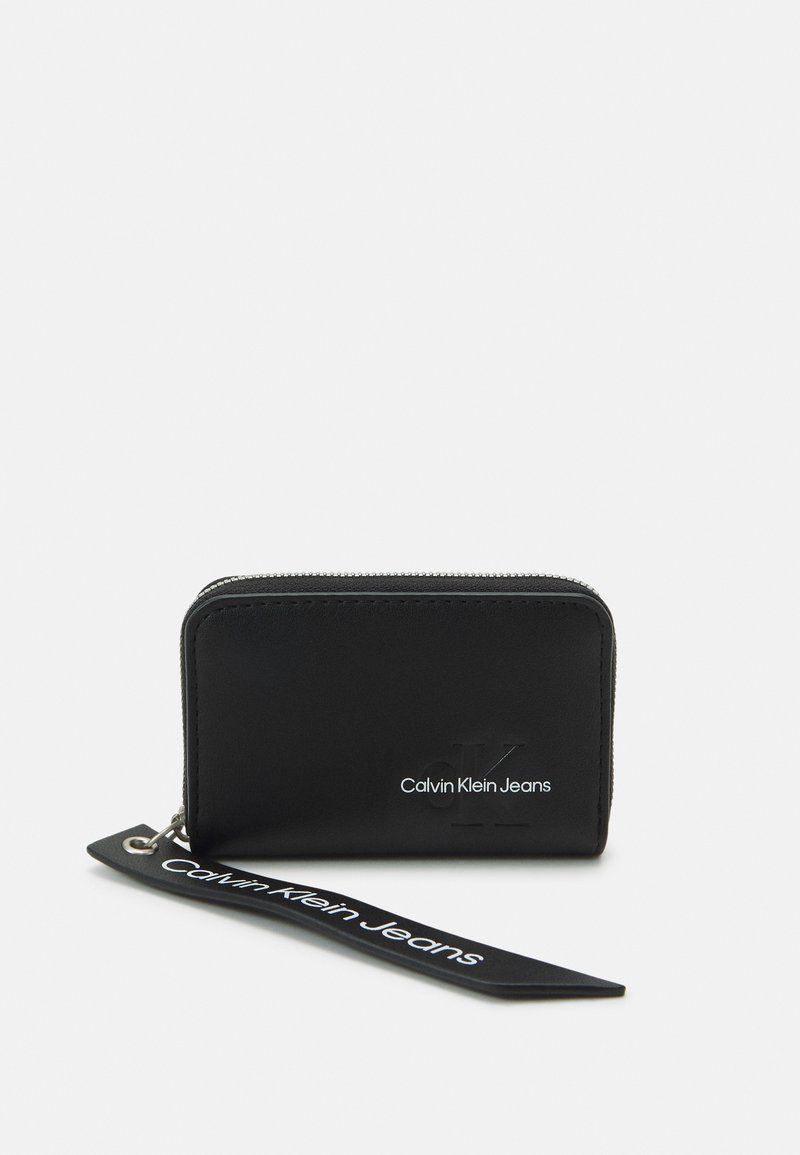 Calvin Klein Jeans SCULPTED MED ZIP AROUND Wallet black Zalando.co.uk