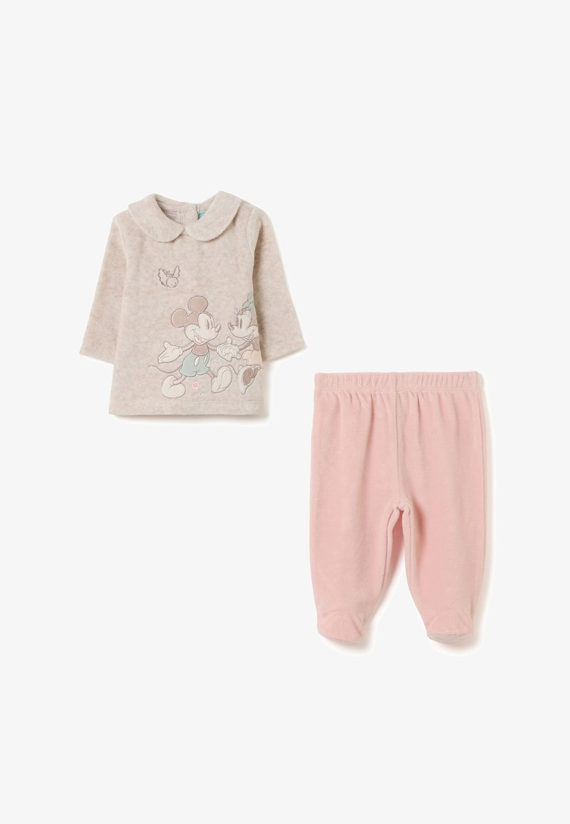 Haut beige à manches longues avec un col et des personnages Disney imprimés sur le devant, associé à un pantalon en polaire rose pâle doté d'une taille élastique.