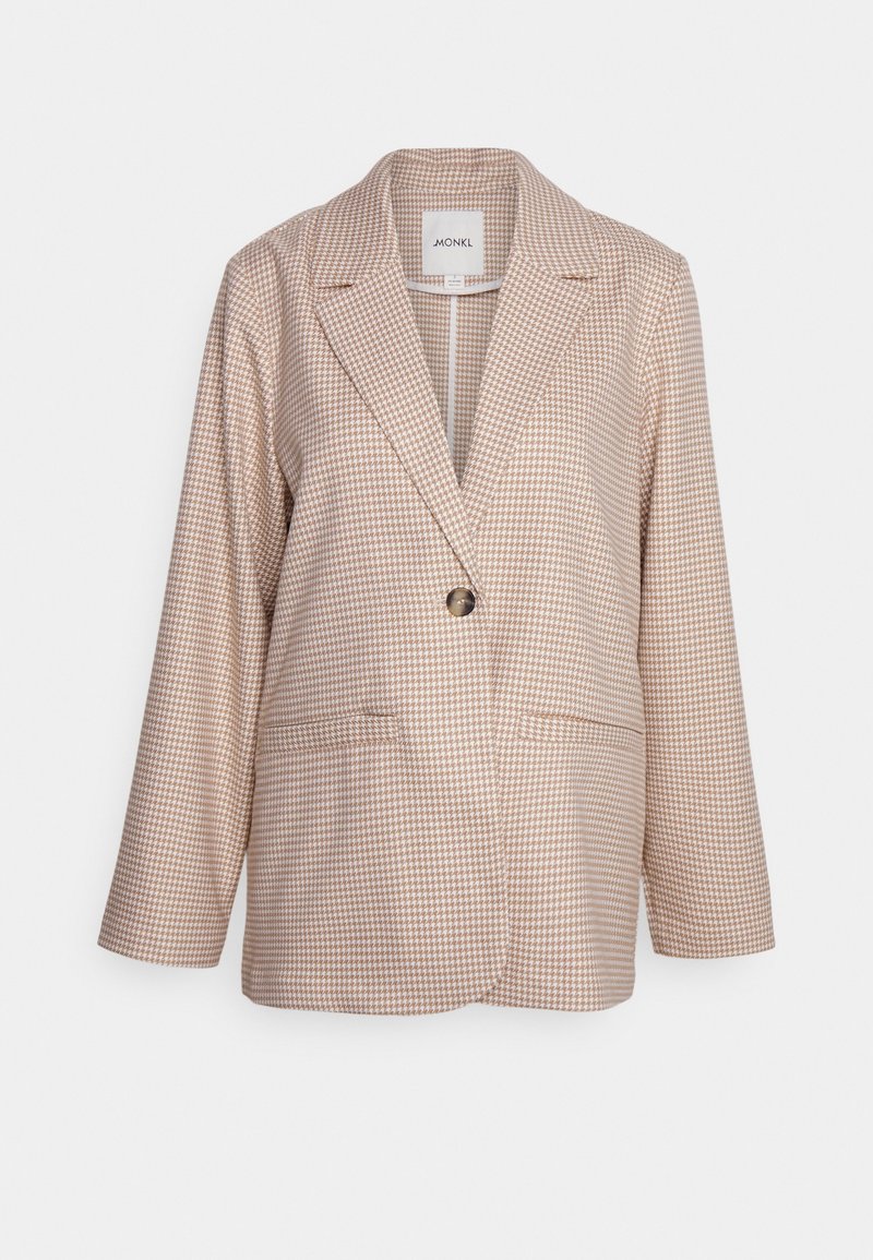 Blazer beige et blanc à motif pied-de-poule avec revers crantés, fermeture à un bouton et deux poches fendues sur le devant.