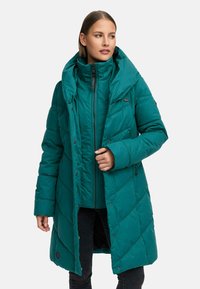 Teal puffer coat featuring a hood, diagonal quilting, front zip closure, and snap buttons. Made from a soft, insulated fabric.