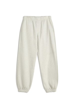 Pantaloni della tuta grigi chiari realizzati in tessuto morbido, con vita elasticizzata e polsini a costine. Inclusi tasche laterali per riporre oggetti.