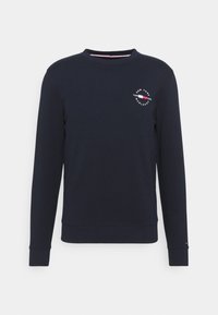 Felpa blu navy realizzata in tessuto morbido, con collo rotondo, maniche lunghe e un logo stampato sul petto.