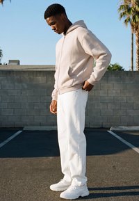 Karl Kani SMALL SIGNATURE TEDDY TROYER UNISEX  - Fleece jumper - light sand