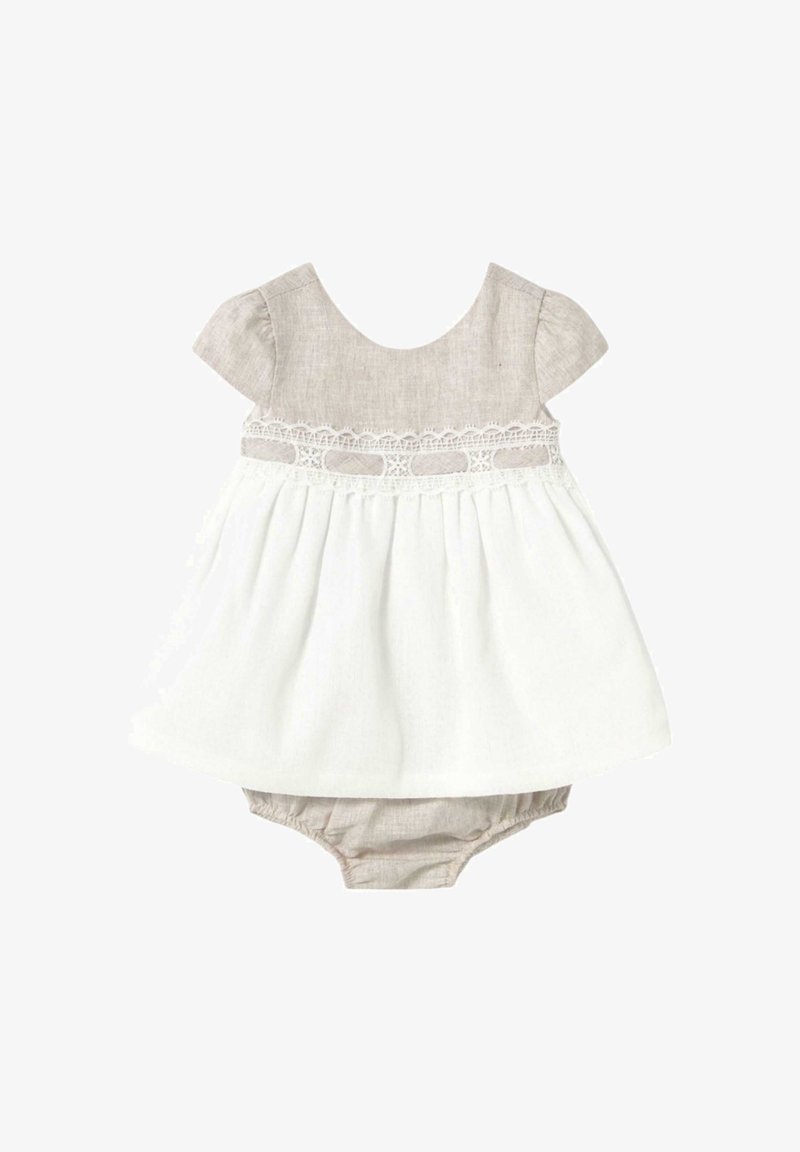 Abito leggero con maniche corte, corpetto in lino beige, gonna in cotone bianco e pizzo decorativo in vita. Include pantaloni a sbuffo integrati.