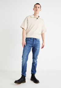 Dr. Martens Kotníková obuv - black