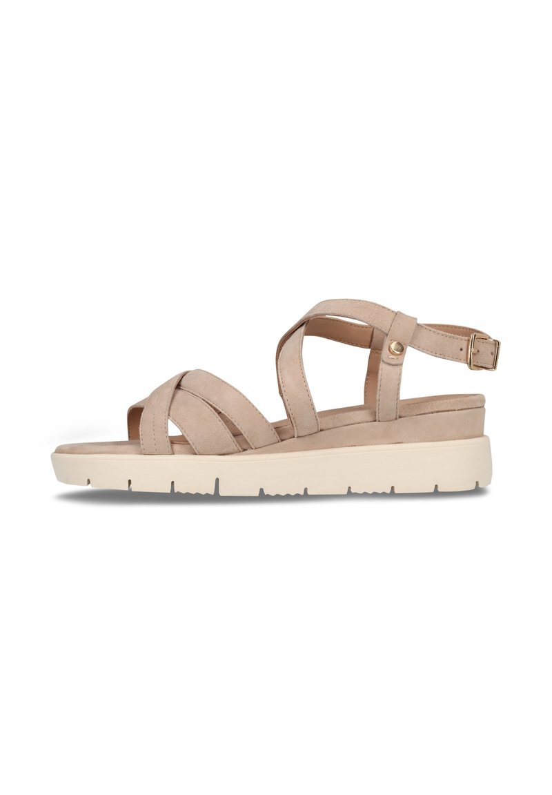 Beige Sandalen mit Kreuzriemen, verstellbarem Knöchelriemen und einer leichten Plattformsohle. Glatte Textur und minimalistisches Design.