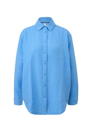 Chemise bleu clair à manches longues avec boutons, tissu texturé et col classique, présentée sur fond blanc.