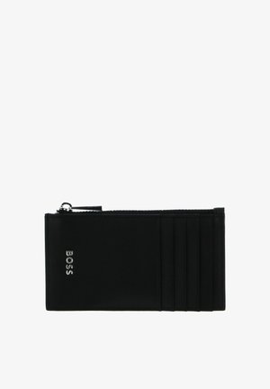 Portefeuille en cuir noir avec fermeture éclair, comprenant plusieurs emplacements pour cartes, logo embossé et texture lisse. Forme rectangulaire compacte.