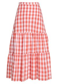Karierter Rock in Koralle und Weiß, mit gestuftem Design und gewelltem Saum, aus leichtem Stoff gefertigt. Mit elastischem Bund.