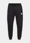 DOAK - Pantaloni de trening - black