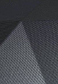 Textured black fabric features subtle horizontal stripes with a glossy sheen and varying shades, creating a layered appearance.