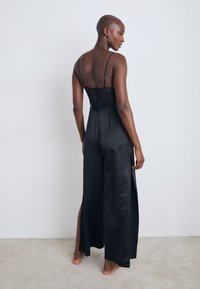 Hunkemöller JUMPSUIT ZOE - Pyžamo - black