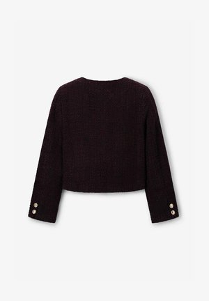 Gekürzte dunkelviolette Jacke aus strukturiertem Stoff, mit weitem Ausschnitt und langen Ärmeln, die goldene Knopfdetails an den Manschetten aufweisen.