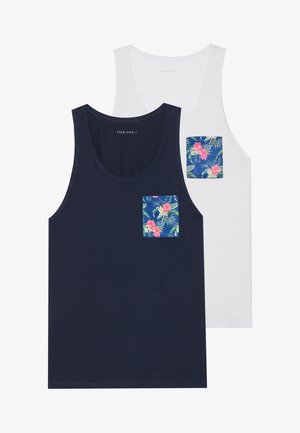 Deux débardeurs, un bleu marine et un blanc, tous deux ornés d'une poche à motif floral. Fabriqués en tissu doux, avec un col rond.