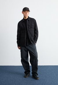 Carhartt WIP TRUMAN UNISEX - Naģene - chocolate/black