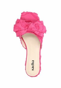 Roze schuifsandalen met een textiele bovenkant, voorzien van een grote, geplooide strik en een gladde binnenkant. Merken op de zool.