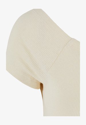 Kremasta rebrasta pletenina, ki se ponaša z obliko kratkih rokavov in širokega ovratnika. Gladka tekstura z oprijetim krojem.