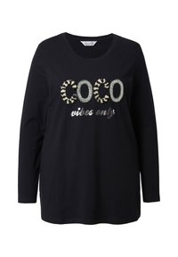 Schwarzes langärmliges Baumwoll-T-Shirt mit strukturierter "COCO"-Applikation in Silber und Creme, dazu "vibes only" in metallischer Schrift.