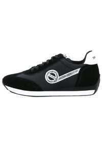 Black sneaker with suede and textile materials, featuring a silver logo design, round toe, lace-up closure, and white rubber sole.