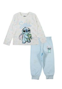 Ensemble de pyjama en coton comprenant un haut à manches longues blanc avec des pois multicolores et un bas bleu. Le haut affiche Stitch tenant une grenouille.