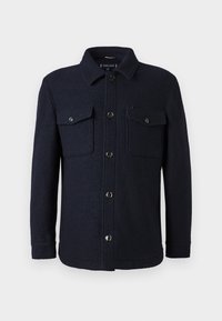 Knickergraue Wolljacke mit Knöpfen, Kragen und zwei aufgesetzten Taschen auf der Brust, langen Ärmeln und geradem Saum.