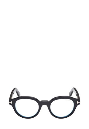 Occhiali in acetato nero con lenti rotonde, dettagli in azzurro chiaro e particolari in metallo sulle astine. Presentano una forma audace e unica.