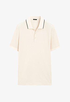 Polo-shirt i lys cremefarve med korte ærmer, sort kant ved kraven, tre-knaps lukning og blød tekstur. Enkel design til hverdagsbrug.
