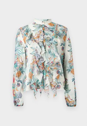 Blouse à manches longues ornée d'un imprimé botanique coloré et de tigres, avec des volants superposés à l'avant et un col montant boutonné sur un tissu léger.