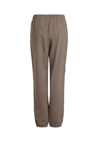 Braune, lässige Sweatpants mit elastischem Bund und Bündchen; aus weichem Material gefertigt. Verfügt über ein Markenlogo auf der linken Seite.