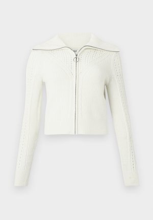 Bijeli pletivi dukserica na zip, s teksturiranim uzorcima, dugim rukavima, širokim kragnom i okruglim povlačenjem zamaha.