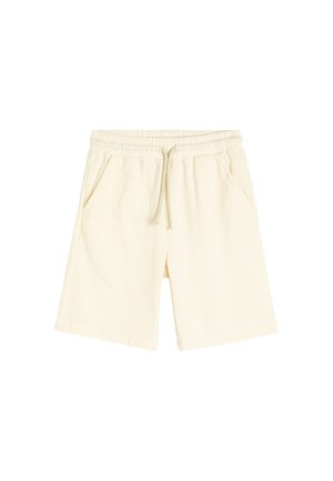 Lys beige shorts lavet af et struktureret stof, med en elastisk talje, snøre og to sidelommer.