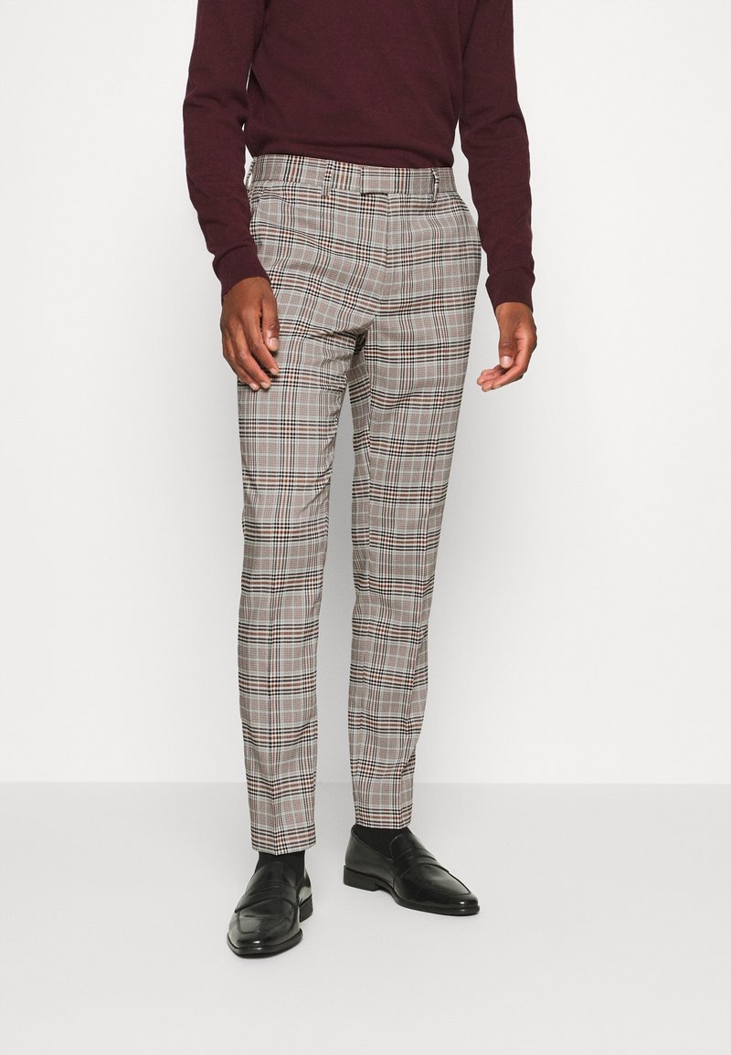 Karierte Hose mit einem beigen, braunen und schwarzen Muster, taillierte Passform, mit seitlichen Taschen und einem Gürtelschlaufenbund.